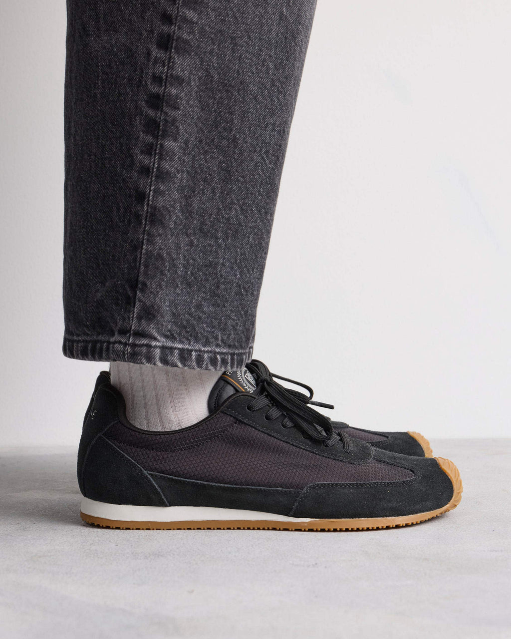 Sneaker Row en cuero y textil