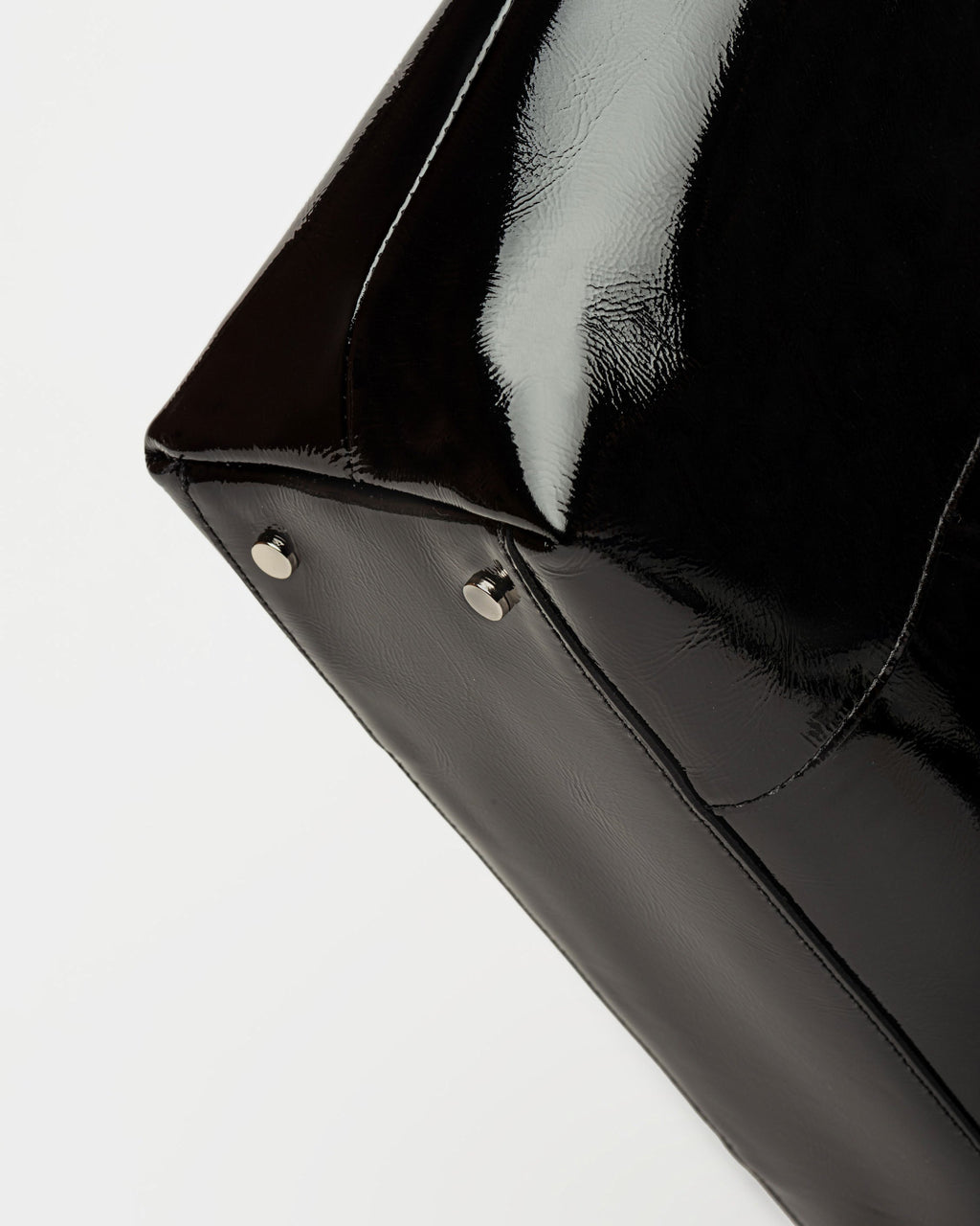 Bolso The Icon en cuero charol arrugado