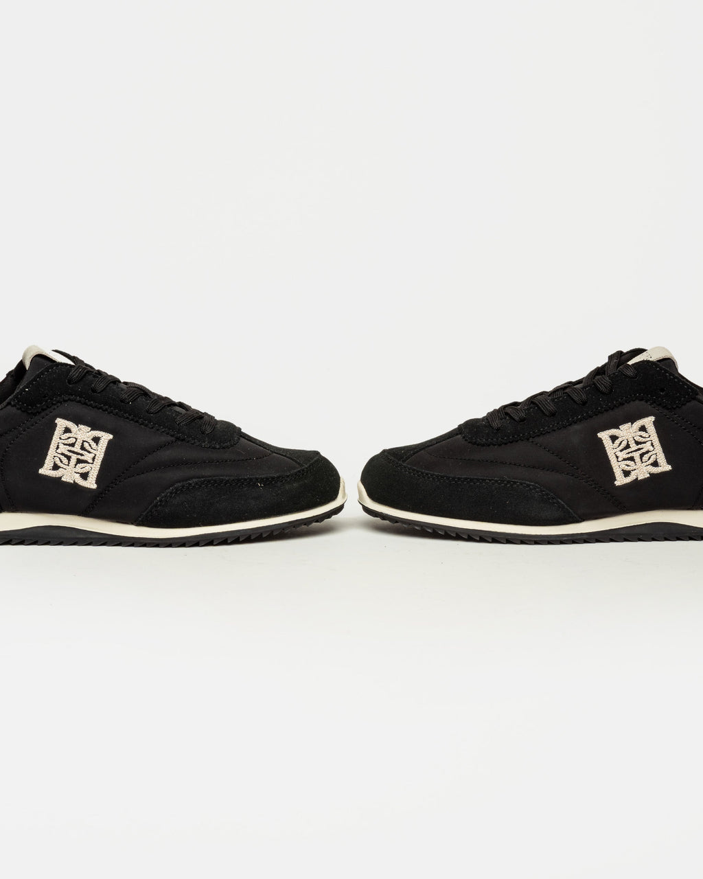 Sneaker Olimpia en cuero y textil