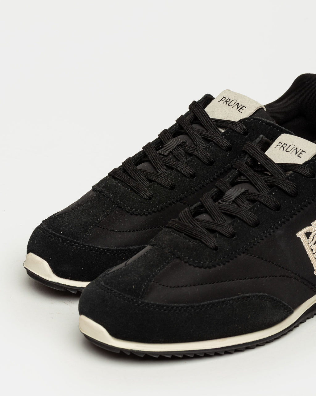 Sneaker Olimpia en cuero y textil